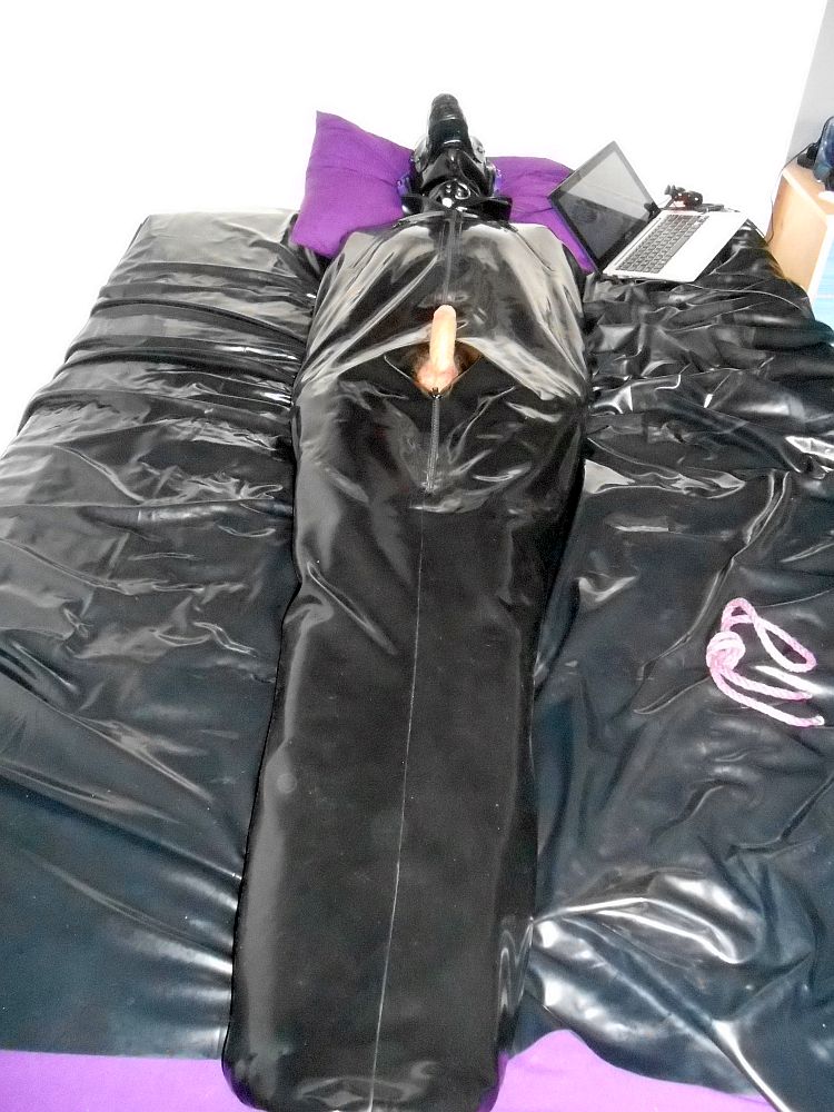 Clearly it was a turn-on in the awesome rubber sleepsack!