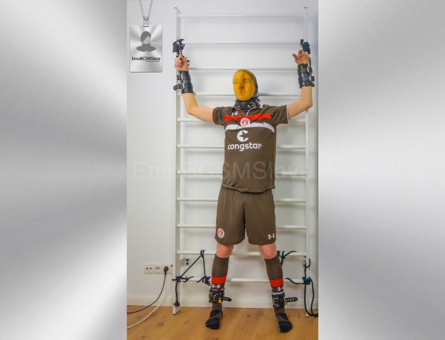 Soccer EmoBCSMSlave tied to wall bars and vacuum mask breath controlled