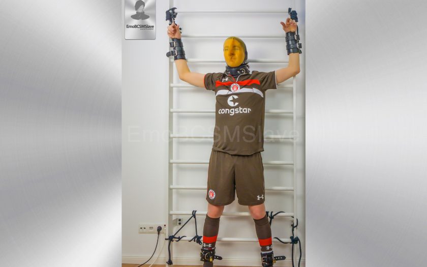 Soccer EmoBCSMSlave tied to wall bars and vacuum mask breath controlled