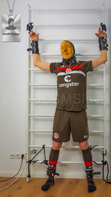 Soccer EmoBCSMSlave tied to wall bars and vacuum mask breath controlled
