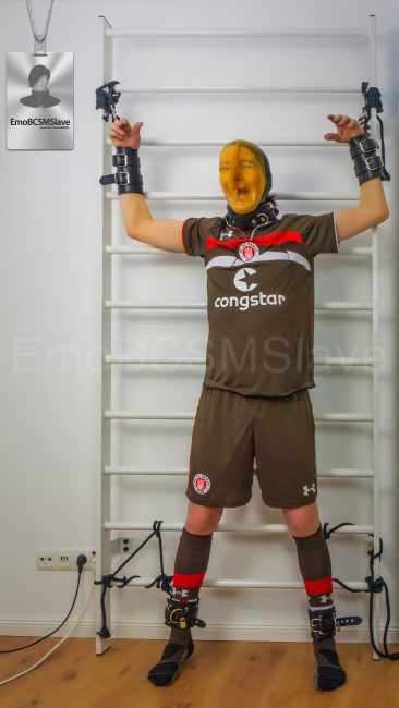 Soccer EmoBCSMSlave tied to wall bars and vacuum mask breath controlled