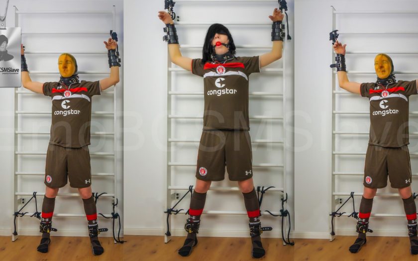 Soccer EmoBCSMSlave tied to wall bars and vacuum mask pass out